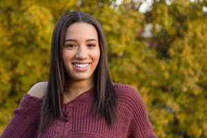 smiling teen after completing a residential treatment center program in Utah